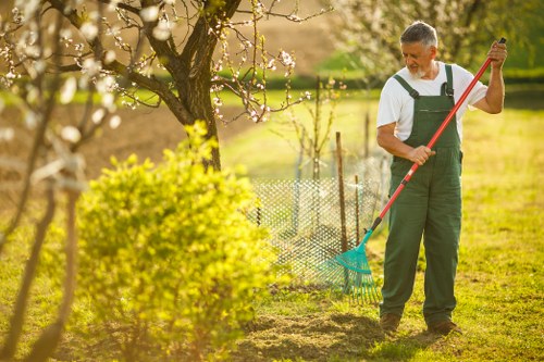 Customer receiving alternative format information about hedge trimming in Highbury